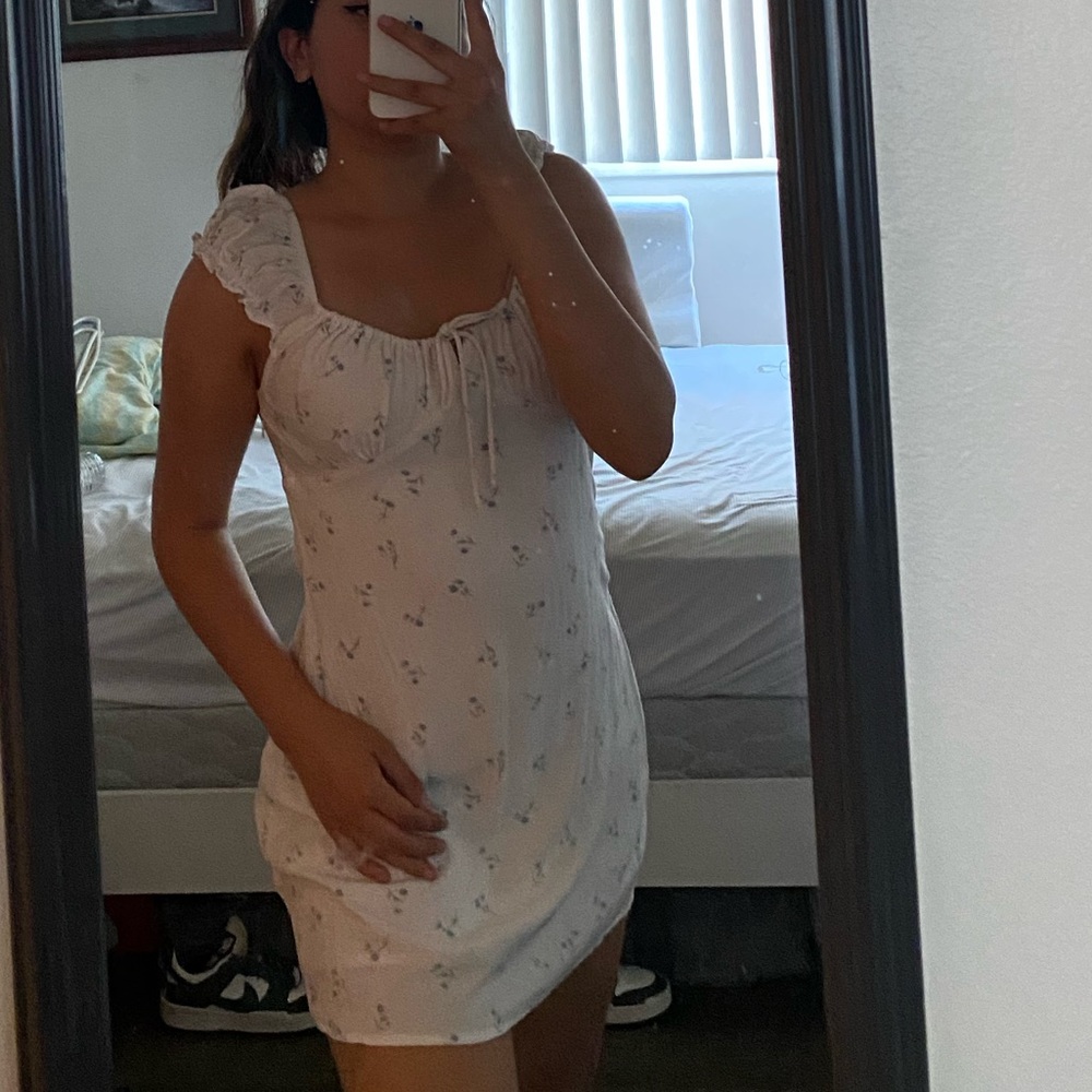 Short and flowy white skater dress from cotton on. Looks pretty and dainty!